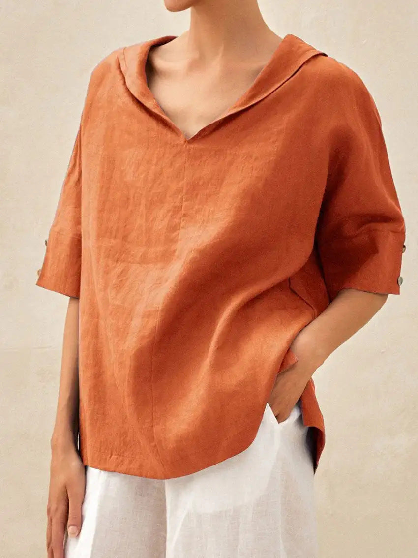 The classic linen blouse with a V-neck