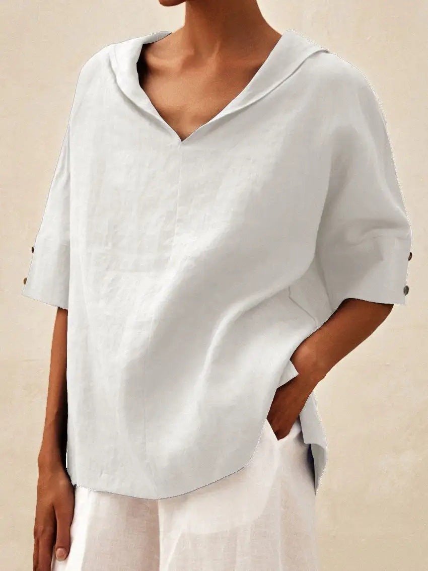 The classic linen blouse with a V-neck