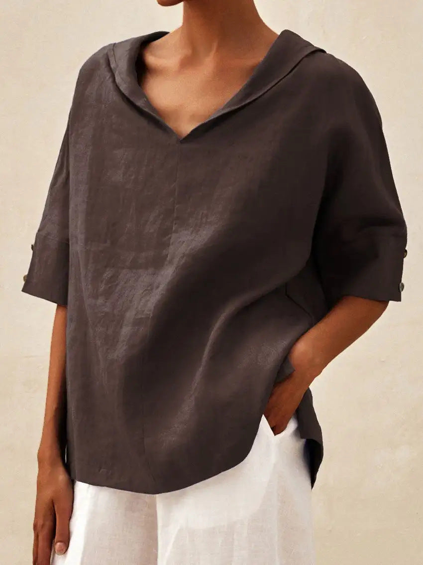 The classic linen blouse with a V-neck