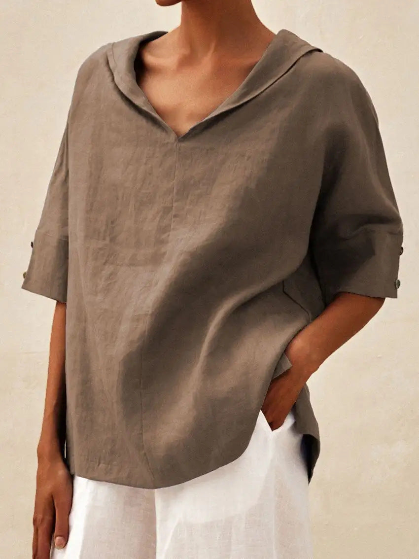 The classic linen blouse with a V-neck